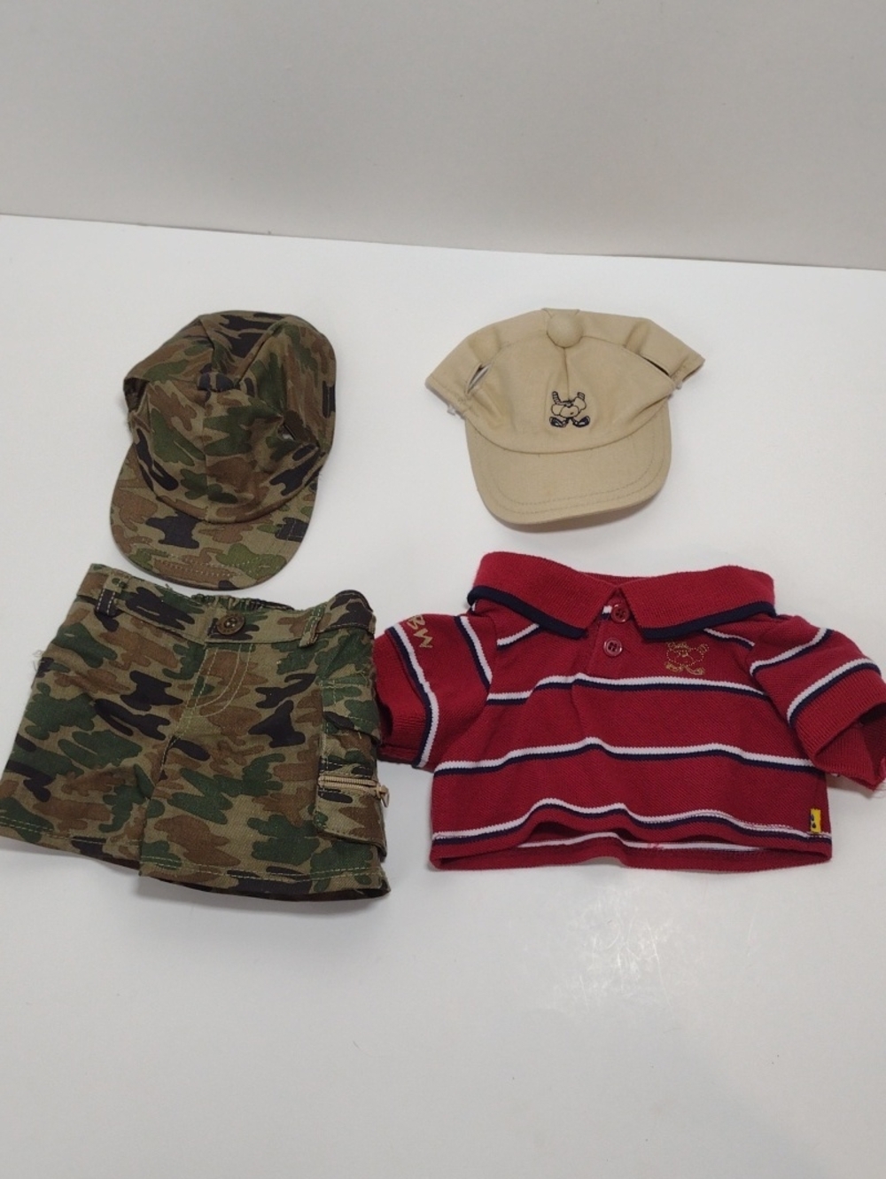 Build-A-Bear  Set Of 4 Polo Top with Navy & White Trim 2 Hats And Camo Shorts
